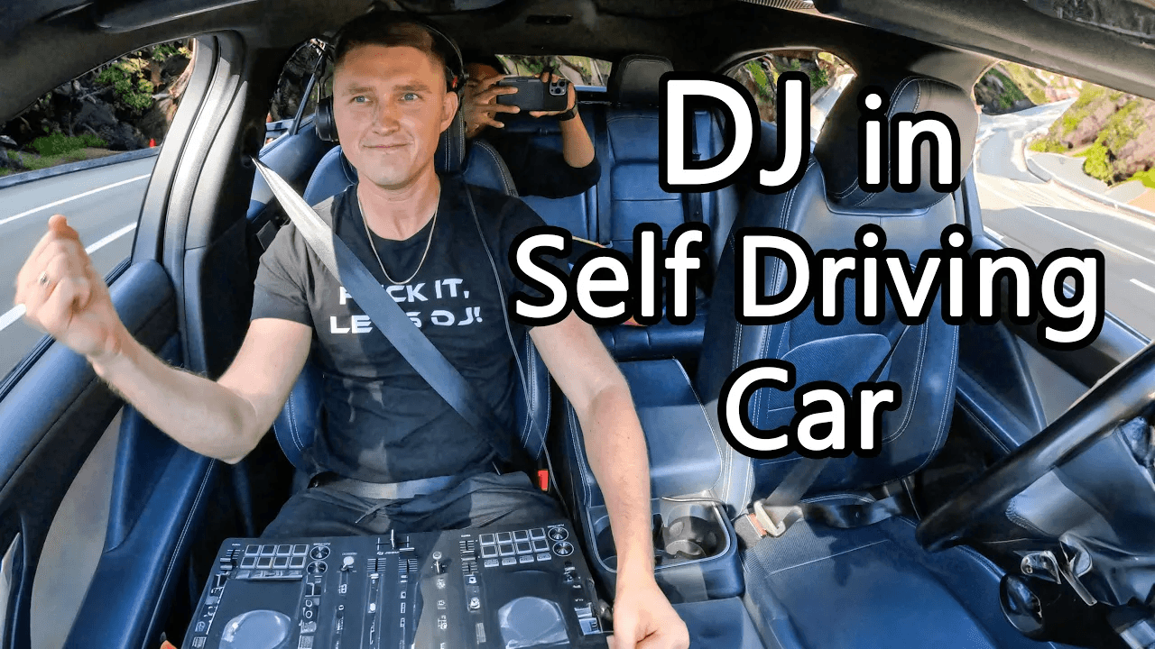 Oleksandr with headphones and a DJ controller inside a Waymo, with the words DJ in Self Driving Car